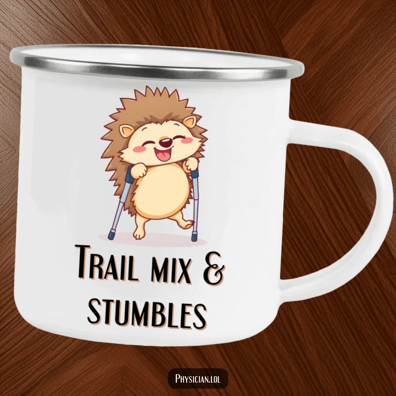 Funny hedgehog camping mug showing a giggling creature doing a cartwheel on crutches, designed for outdoor enjoyment and humorous moments.