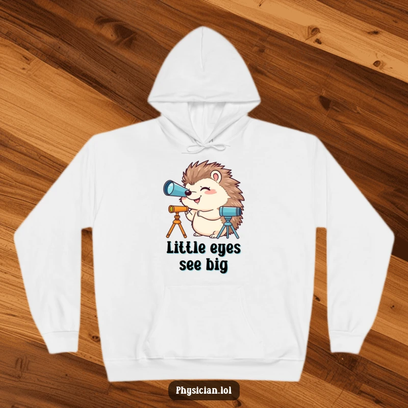Funny hoodie depicting a giggling hedgehog using a miniature telescope, providing warmth and a humorous sense of cosmic exploration.