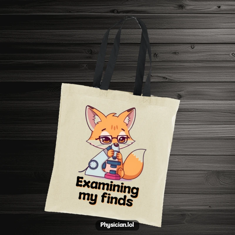 Funny Fox Tote Bag: a determined fox intensely studies through a microscope, great for carrying study materials.